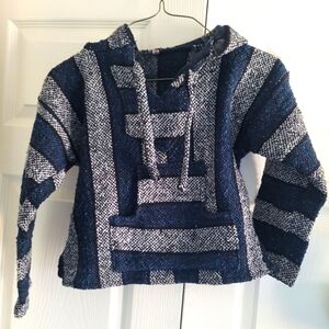 Surf-themed poncho with a hood